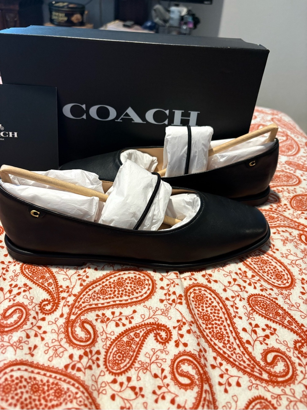 Coach Black Leather Ballet Flats with Subtle Gold Accent